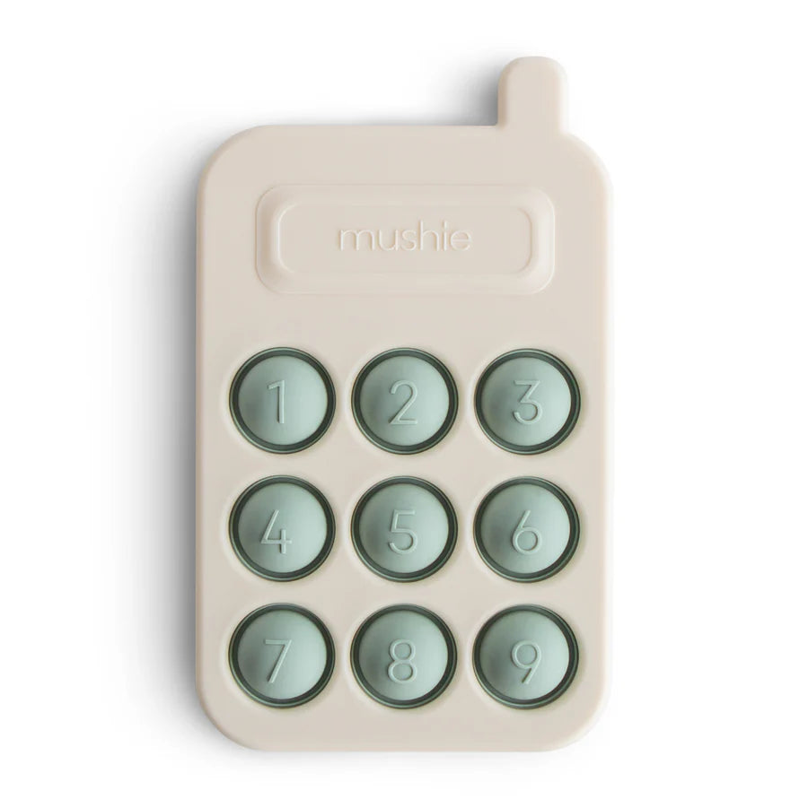 Mushie – silikoninis spaudymo žaislas - žalsvas telefonas